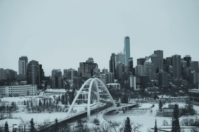 Edmonton skyline over the river valley, illustrating the city's affordable cost of living compared to other Canadian cities
