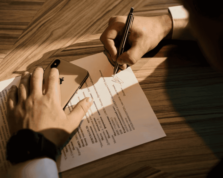 Landlord and tenant signing an Alberta lease agreement for a rental property