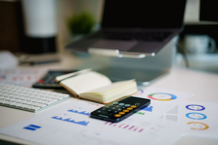Real estate investor meeting a real estate accountant in Edmonton to review rental property taxes