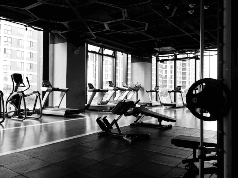 Person working out with dumbbells at one of the best gyms in Edmonton