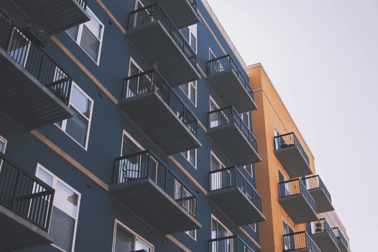 Engineer inspecting the roof and envelope of an Edmonton apartment building during a building condition assessment