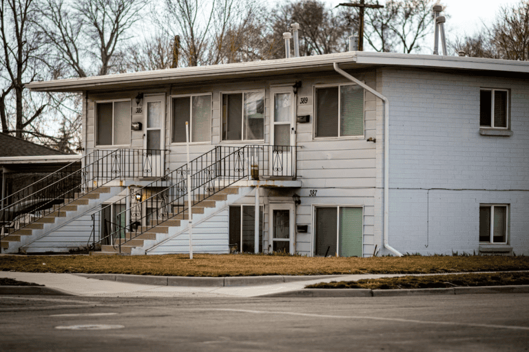 Edmonton investor comparing a duplex vs fourplex to decide which multi-family property is the better investment