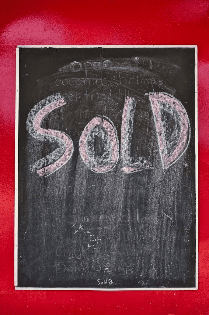 Sold sign in front of an Edmonton home, representing how to sell your house fast in Edmonton
