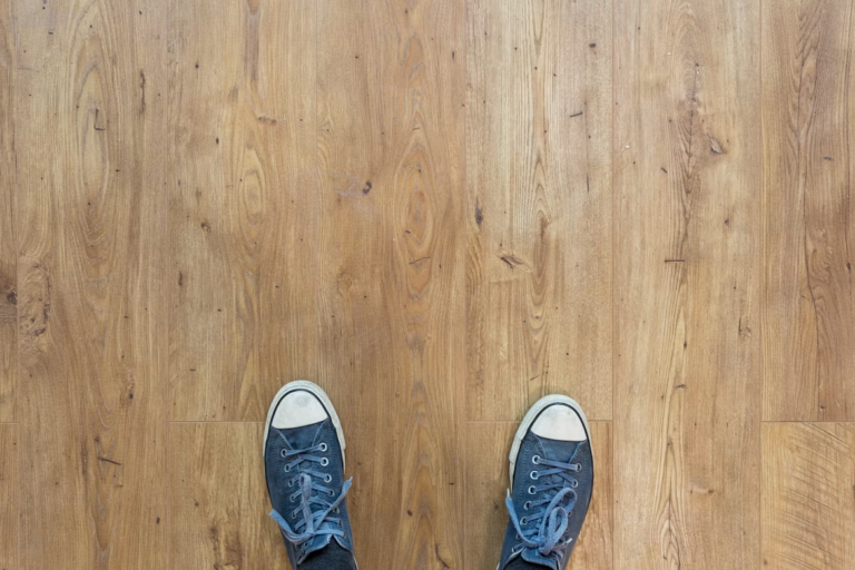Freshly installed luxury vinyl plank flooring in an Edmonton home, adding to home value before selling