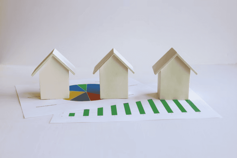 Edmonton realtor reviewing rental property numbers with a real estate investor client