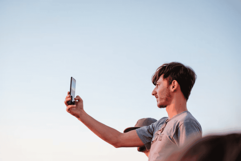 Edmonton realtor filming a short video on a phone, a guide to TikTok for real estate agents