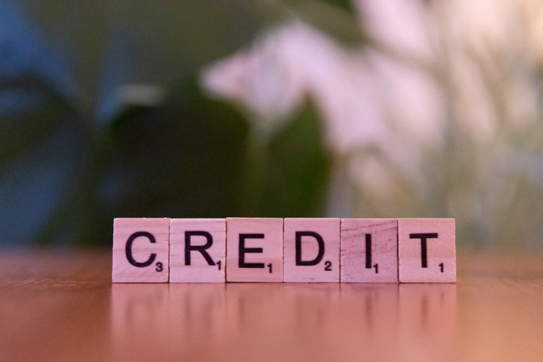 Investor reviewing a credit report before real estate investing with bad credit in Alberta
