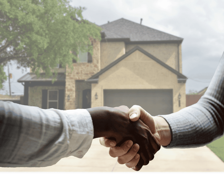 A couple reviewing listings and mortgage numbers as they decide whether to buy a home in Edmonton in 2026