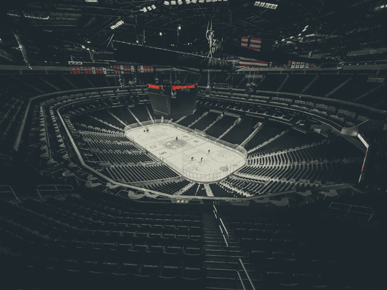 Rogers Place at night in Edmonton, the heart of the best Edmonton communities for Oilers fans