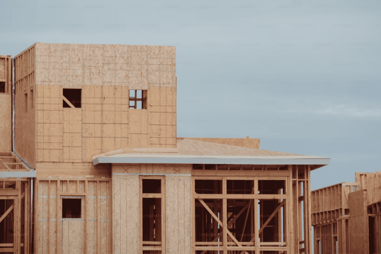 Newly built Edmonton home with fresh siding and landscaping covered by the Alberta new home warranty